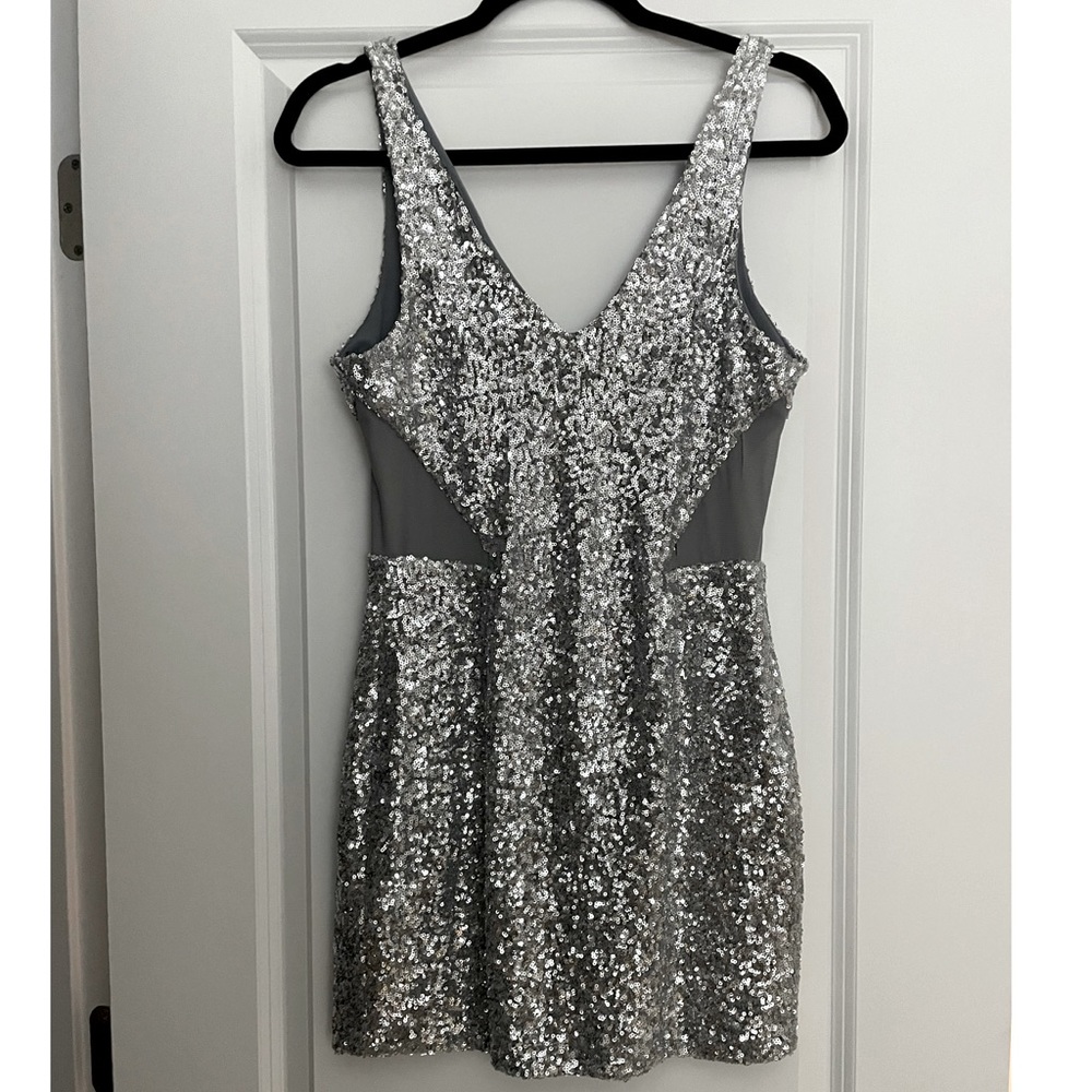 Silver sequin mini dress by Bebe size S
